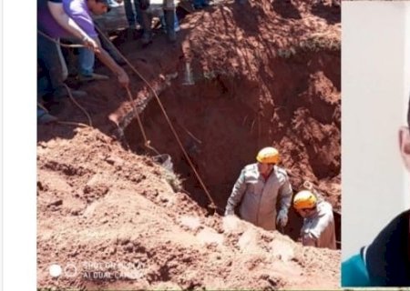 Homem morre após fossa desabar .