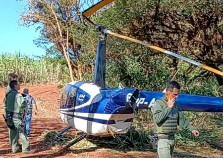 Operação da Polícia Militar apreendeu um helicóptero transportando droga, piloto estava com uma pistola